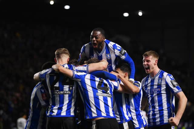 SHEFFIELD, ENGLAND - JANUARY 07: Josh Windass of Sheffield Wednesday celebrates with team mates after scoring their sides second goal during the Emirates FA Cup Third Round match between Sheffield Wednesday and Newcastle United at Hillsborough on January 07, 2023 in Sheffield, England. (Photo by Laurence Griffiths/Getty Images)