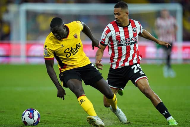 GROWING IN CONFIDENCE: Iliman Ndiaye (right) has become a key player for Sheffield United in the space of 12 months