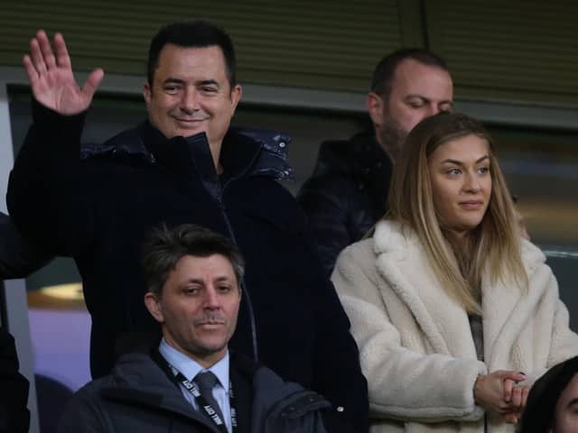 PLANNING: Hull City Tan Kesler (front, left) and owner/chairman Acun Ilicali (waving)