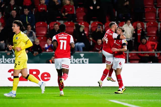 Rotherham United's Dan Barlaser (right) celebrates scoring their side's first goal of the game during the Sky Bet Championship match at AESSEAL New York Stadium, Rotherham. Picture date: Wednesday October 5, 2022.