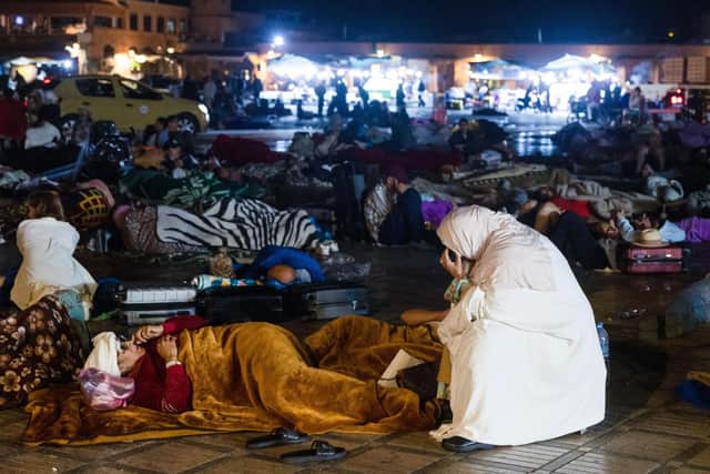 The death toll in a powerful earthquake around Marrakesh has more than doubled to 632 people, with a further 329 injured as authorities assess the damage, Moroccan government officials said. Residents stay out at a square in Marrakesh on September 9, 2023, after an earthquake. (Photo by FADEL SENNA/AFP via Getty Images)