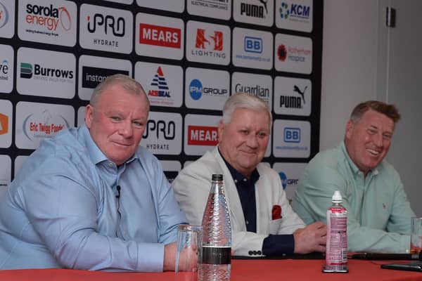 Rotherham United manager Steve Evans (left), pictured alongside chairman Tony Stewart (centre). On the right is Evans' long-time assistant Paul Raynor. Picture: Kerrie Beddows.