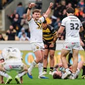 Castleford celebrate a hard-fought win. (Photo: Alex Whitehead/SWpix.com)