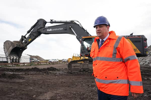 Tees Valley Mayor Ben Houchen stands by plant machinery during a photo call at a ceremony to mark the ground-breaking of the Net Zero Teesside project.