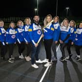 Inspectas' Matthew Fahy and Fiona Lindsay join the Birkenshaw Blue Dogs rounders team to mark their kit sponsorship