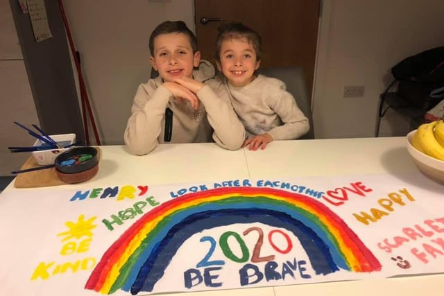 Henry, aged 11 and sister Scarlett, age 8, painted a rainbow with positive messages such as 'be brave' and 'look after each other'