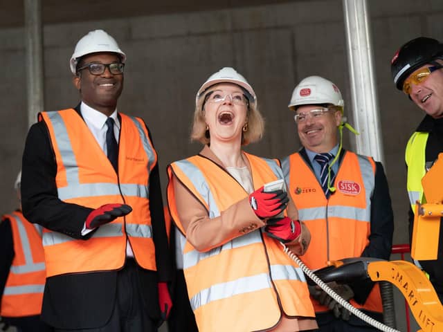 Prime Minister Liz Truss and Chancellor of the Exchequer Kwasi Kwarteng (left) during a visit to a construction site for a medical innovation campus in Birmingham, on day three of the Conservative Party annual conference at the International Convention Centre in Birmingham. Picture date: Tuesday October 4, 2022. PA Photo. See PA story POLITICS Tory. Photo credit should read: Stefan Rousseau/PA Wire