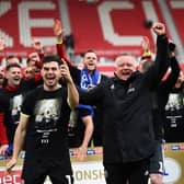 STOKE ON TRENT, ENGLAND - MAY 05:  Chris Wilder, Manager of Sheffield United and John Egan celebrate their promotion after the Sky Bet Championship match between Stoke City and Sheffield United at Bet365 Stadium on May 05, 2019 in Stoke on Trent, England. (Photo by Nathan Stirk/Getty Images)