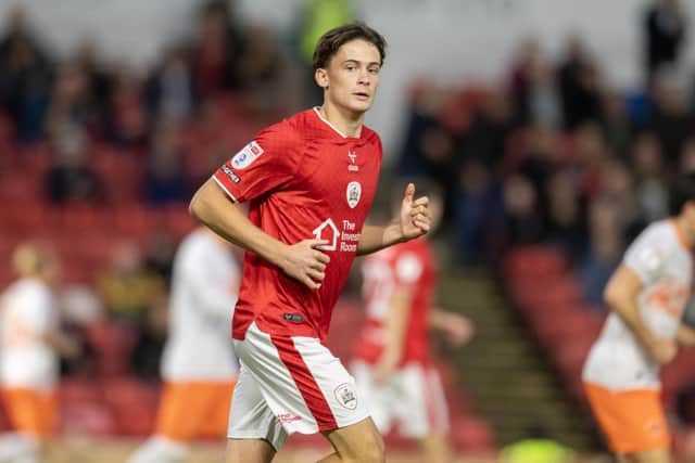 Barnsley's Luke Alker has started every game this season for the Reds, alongside fellow teenager Arley Kay. Photo: Tony Johnson.