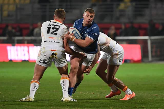 Jack Brown takes the ball in against Catalans Dragons. (Photo: Olly Hassell/SWpix.com)
