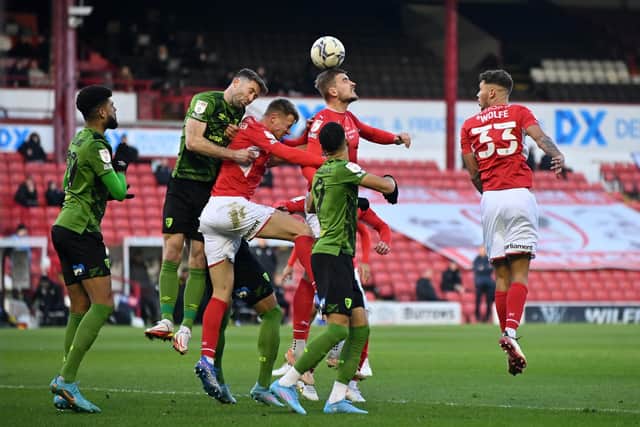 Michal Helik rises for a high ball.(Picture: Bruce Rollinson)
