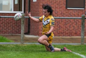 Will Charlesworth celebrates a try for Castleford Tigers academy. (Photo: Simon Hall, Castleford Tigers)