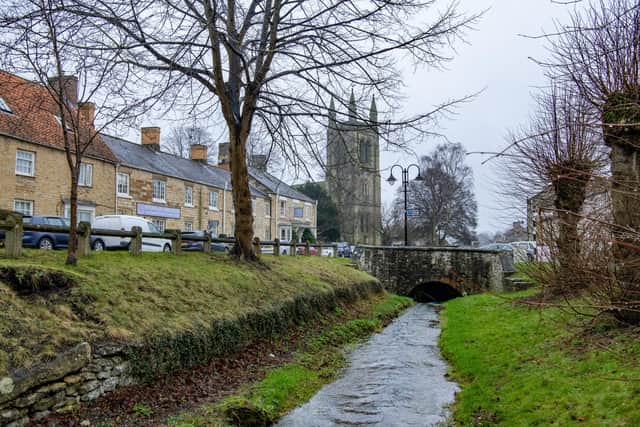 Feature on Helmsley in North Yorkshire photographed by Tony Johnson for The Yorkshire Post.   
The beck running through Helmsley with spa hotel, The Feversham Arms and the Church of All Saints.