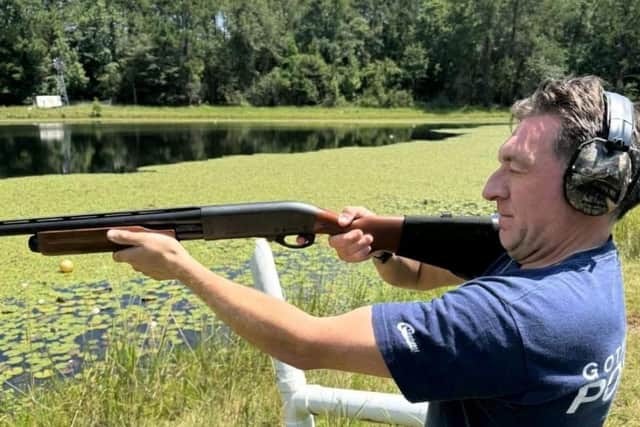 The picture of Jon Richelieu-Booth with a shotgun was part of a police investigation.