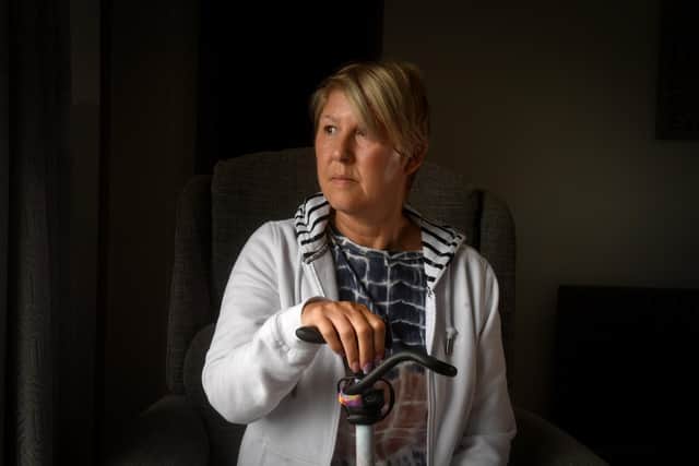 Kerry Hurt, who suffered a stroke after having the Covid jab in 2021. Her life has been totally changed and she has mobility problems. She is working with law firm Leigh Day to call on the Government to provide fair compensation to people who had a terrible reaction to Covid jab, Osborne Road, Kiveton, Sheffield. Picture taken by Yorkshire Post Photographer Simon Hulme 21st May 2024
