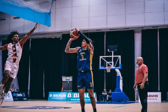 Channel Banks, one of four recruits in the summer, takes a three-point shot against Leicester Riders (Picture: Adam Bates)