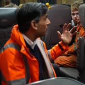 Prime Minister Rishi Sunak talks to an apprentice during his visit to the GWR railway traction maintenance depot in Penzance, Cornwall. PIC: Aaron Chown/PA Wire