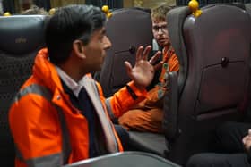 Prime Minister Rishi Sunak talks to an apprentice during his visit to the GWR railway traction maintenance depot in Penzance, Cornwall. PIC: Aaron Chown/PA Wire