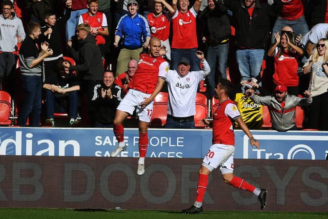 Georgie Kelly celebrates scoring the winner for Rotherham against Huddersfield Town as Matt Taylor celebrated his first win in charge. (Picture: Jonathan Gawthorpe)