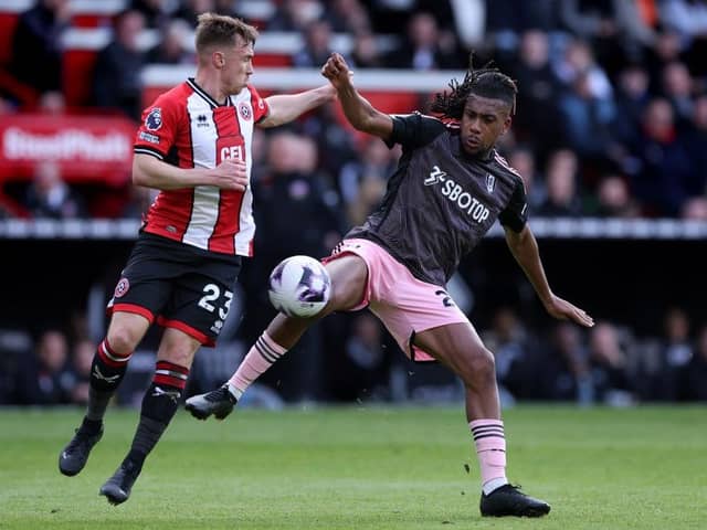 DISAPPOINTMENT: Sheffield United wing-back Ben Osborn challenges Fulham's Alex Iwobi