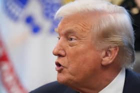President Donald Trump speaks to reporters. PIC: AP Photo/Jacquelyn Martin