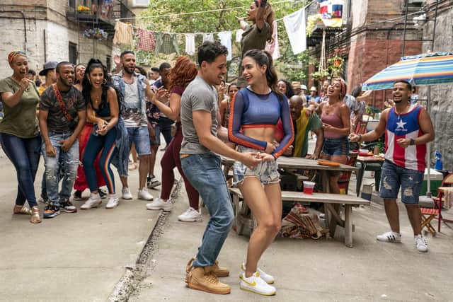 Corey Hawkins as Benny and Leslie Grace as Nina in  In The Heights.  Picture: PA Photo/Warner Bros. Entertainment Inc./Macall Polay.