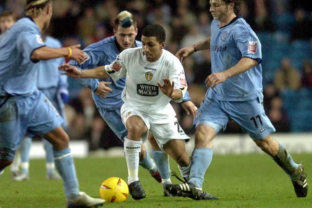 NO MORE: Aaron Lennon, in action for Leeds United as he looks to get through the QPR defence back in November 2004. Picture: Jonathan Gawthorpe.