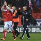 Former Rotherham United manager Neil Warnock and matchwinner Lee Frecklington celebrate a famous survival win over Middlesbrough at the AESSEAL New York Stadium in March 2016. The Millers' secured another memorable success over Boro on Boxing Day to revive hopes of another 'Great Escape.' Picture: PA.