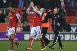 Former Rotherham United manager Neil Warnock and matchwinner Lee Frecklington celebrate a famous survival win over Middlesbrough at the AESSEAL New York Stadium in March 2016. The Millers' secured another memorable success over Boro on Boxing Day to revive hopes of another 'Great Escape.' Picture: PA.