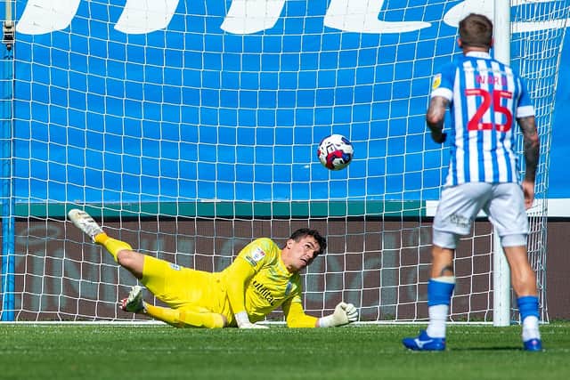 ON THE UP: Goalkeeper Lee Nichols, pictured saving a penalty from Stoke City's Lewis Baker, has shaken off a slightly below-par start to the season for Huddersfield Town