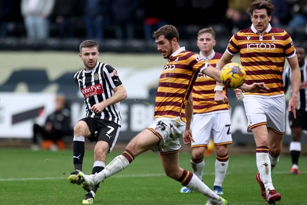 Notts County's Daniel Crowley (left) scores their fourth goal against Bradford City during the Sky Bet League Two match at Meadow Lane. Picture: Bradley Collyer/PA Wire.