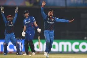 Out: Afghanistan’s Rashid Khan celebrates the wicket of England’s Liam Livingstone during the ICC Men’s Cricket World Cup in Delhi, India. (Photo by Gareth Copley/Getty Images)