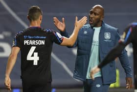Moore the merrier: New Huddersfield Town manager Darren Moore shakes hands with Matty Pearson after the late equaliser at Coventry (Picture: Nigel French/PA Wire)