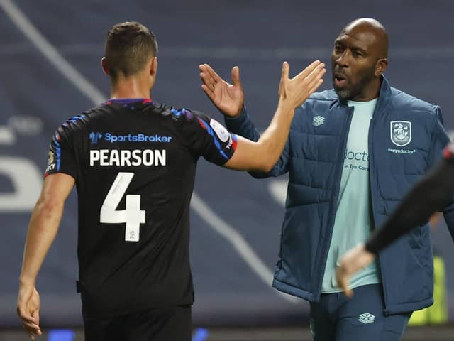 Moore the merrier: New Huddersfield Town manager Darren Moore shakes hands with Matty Pearson after the late equaliser at Coventry (Picture: Nigel French/PA Wire)