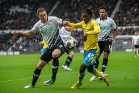 Craig Forsyth and Alex Mighten challenge for the ball in Derby County's game with Sheffield Wednesday. Picture: Bruce Rollinson