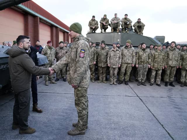 Prime Minister Rishi Sunak and Ukrainian President Volodymyr Zelensky meet Ukrainian troops being trained to command Challenger 2 tanks at a military facility in Lulworth, Dorset. PIC: Andrew Matthews/WPA Pool/Getty Images