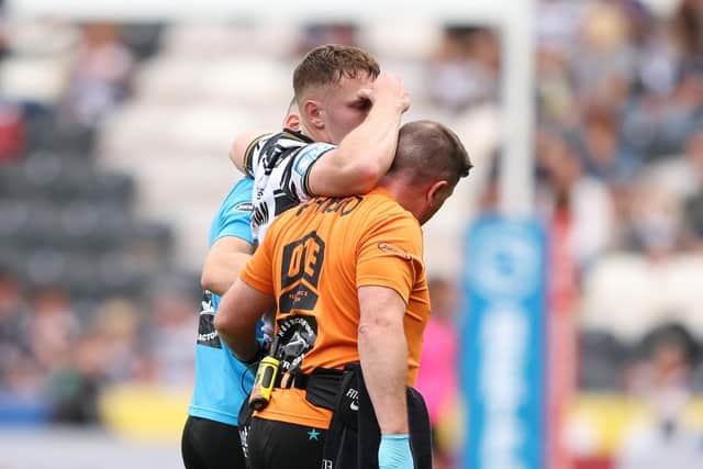 BAD LUCK: Hull FC's Jake Trueman is helped off the pitch after picking up an injury Picture by John Clifton/SWpix.com