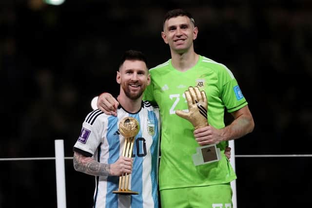 GOLDEN BOY: 2022 World Cup golden glove winner Emiliano Martinez poses with player of the tournament and Argentina team-mate Lionel Messi