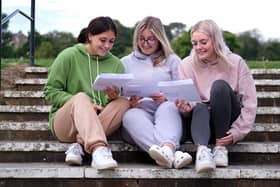 Making the grade: Students Macey Lovitt, Poppie Daniel and Alix Barr read their A-level results  at Scarborough Sixth Form College. Picture: Richard Ponter