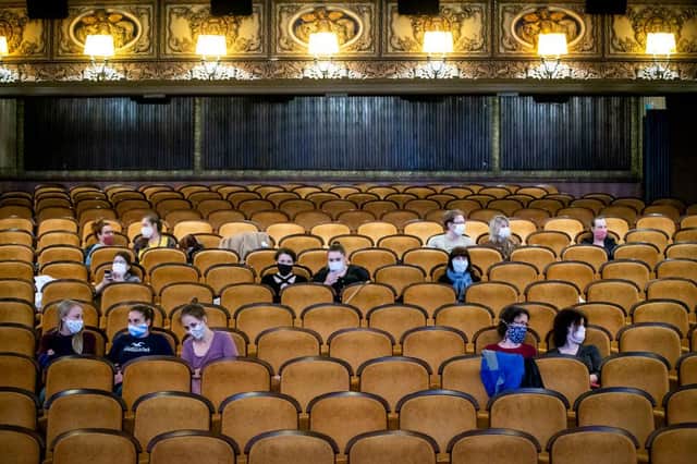 This cinema in Prague asks customers to wear protective masks and sit apart in observance of social distancing measures - could movie theatres in the UK lock similar after 4 July? (Photo: Gabriel Kuchta/Getty Images)