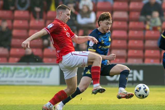 Barnsley's Jonathan Bland, pictured in action in last season's derby against Doncaster Rovers at Oakwell. Photo: Tony Johnson.