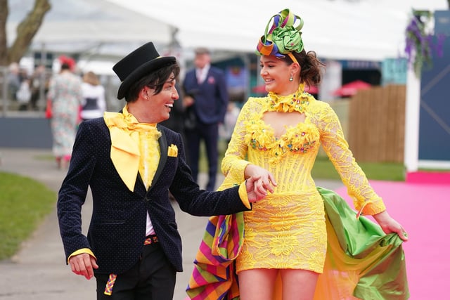 Racegoers from Marcos Fashion Couture during day two of the Randox Grand National Festival at Aintree Racecourse, Liverpool. (Photo credit: Mike Egerton/PA Wire)