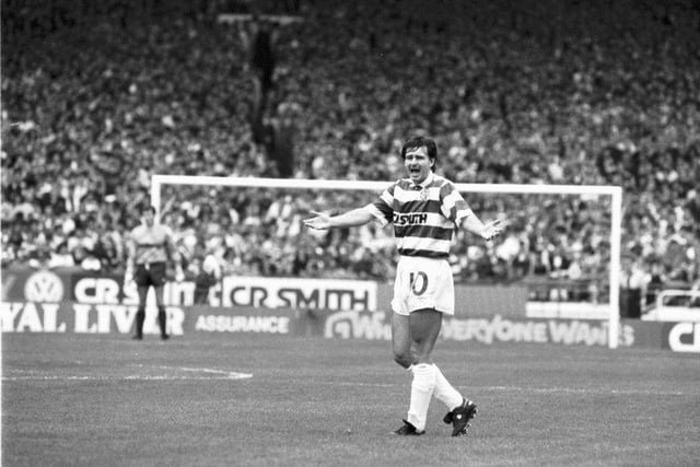 Celtic's Charlie Nicholas appeals for some back-up from the team during a Celtic v Aberdeen football match at Parkhead, Glasgow, in September 1990.