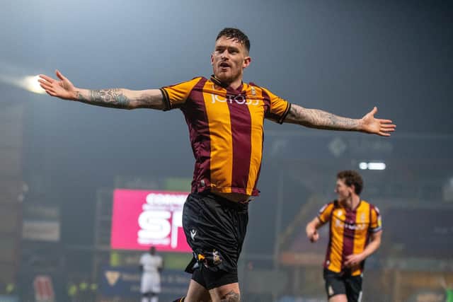 MAN OF THE MOMENT: Andy Cook scored twice to ensure Bradford City got a share of the spoils in a frustrating 2-2 draw at home to Hartlepool United Picture: Bruce Rollinson