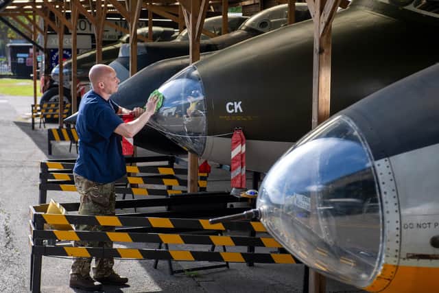 South Yorkshire Air Museum prepares to celebrate 75 year anniversary of the English Electric Canberra bomber.Pictured is Darren Heradleand cleaning his Canberra PR7 cockpit, one of 7 at the museum.Picture Bruce Rollinson