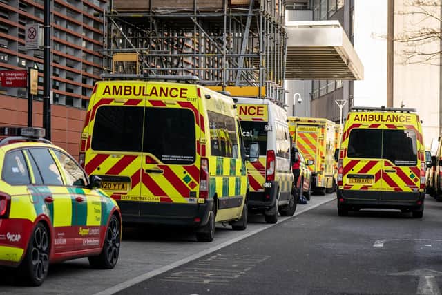 Ambulances waiting at an Emergency Department (A&E) at the Royal London hospital in London, as flu cases in hospitals in England are continuing to rise while ambulance handover delays have hit a new high, as the NHS continues to struggle with bed shortages and a surge in winter viruses.