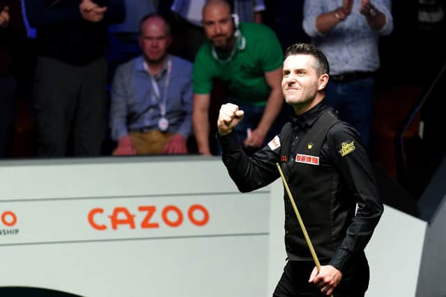 COMING THROUGH: Mark Selby celebrates victory over Mark Allen in their World Snooker Championship semi-final at the Crucible Theatre, Sheffield. Picture: Zac Goodwin/PA