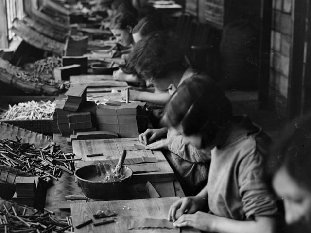 A production line in a fireworks factory at the Standards Works in Huddersfield in October 1930.