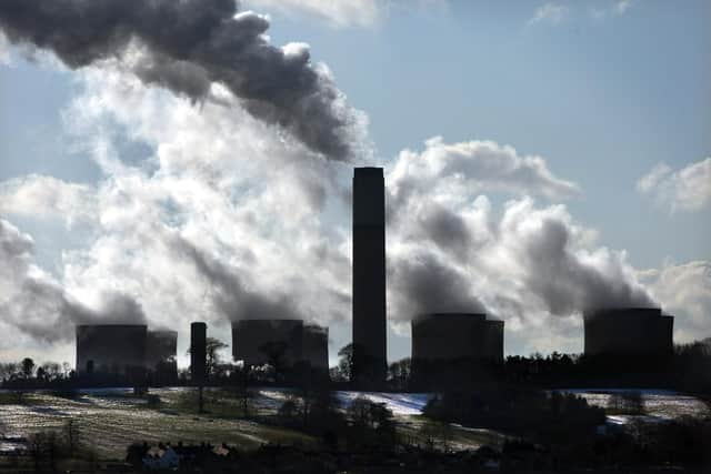 Smoke rising out of chimneys at Ratcliffe on Soar power station near Nottingham. PIC: David Jones/PA Wire