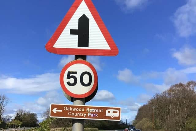 A sign illegally fly-posted for Oakwood Retreat Country Park, close to the site in Newton upon Derwent, East Riding of Yorkshire.